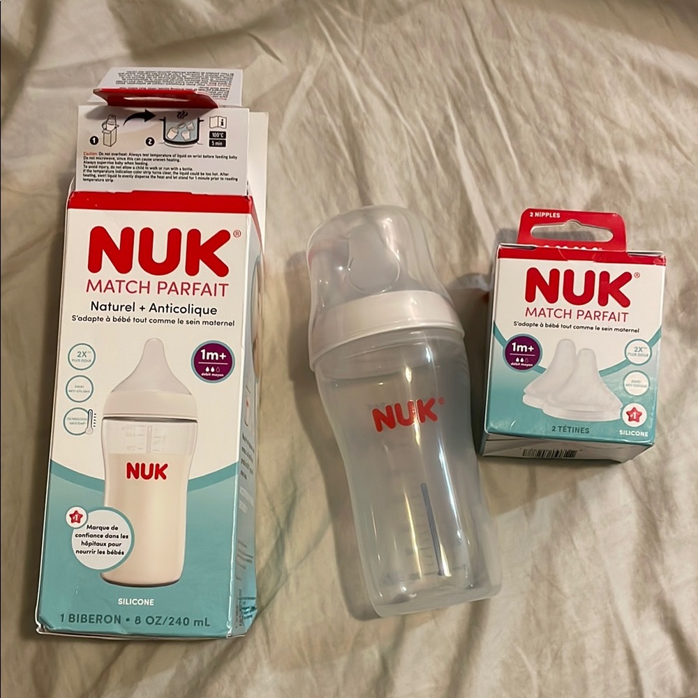NUK baby bottle with 2 extra nipples- 1 month+